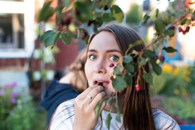 Portrait of young woman outdoors