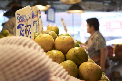 Oranges at market stall for sale