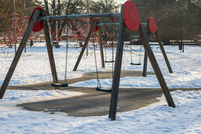 View of swing in winter