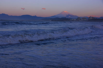 Scenic view of sea against sky during sunset