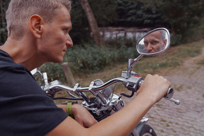 Portrait of man riding bicycle