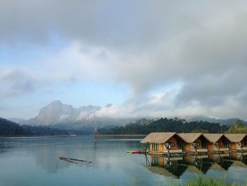 Scenic view of lake against cloudy sky