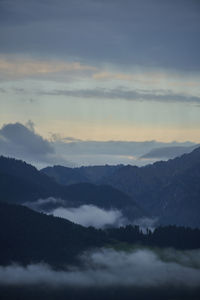 Scenic view of mountains against sky during sunset