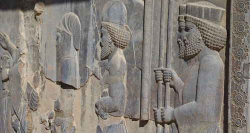 Close-up of craft on wall persepolis