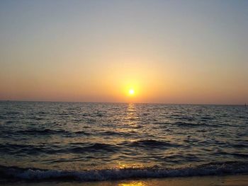 Scenic view of sea at sunset