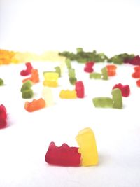 Close-up of colorful objects on white background