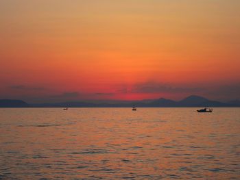 Scenic view of sea at sunset