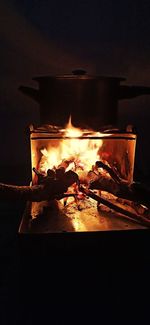 Close-up of fire burning at night