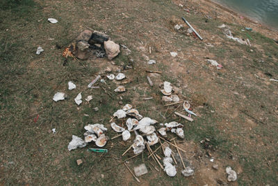 High angle view of garbage on field