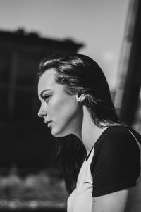 Portrait of a young woman looking away