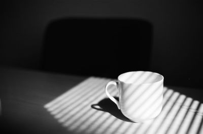 Close-up of coffee cup on table