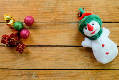 High angle view of christmas decorations on wooden table