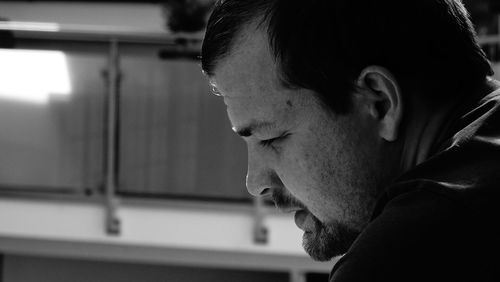 Close-up of thoughtful man looking down