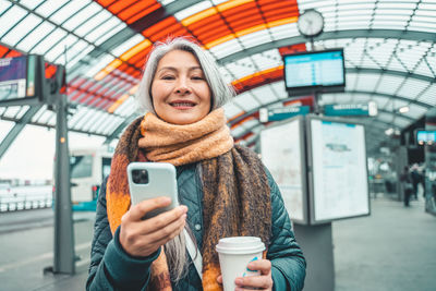 Young woman using phone