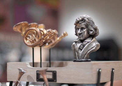 Close-up of statues on table