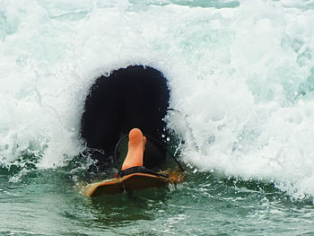 Man surfing in sea