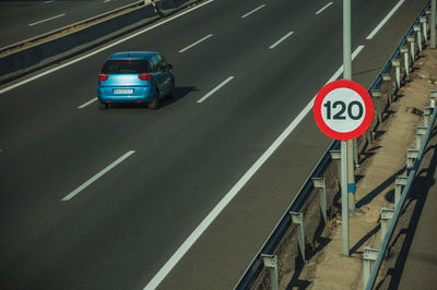 Road sign on street in city