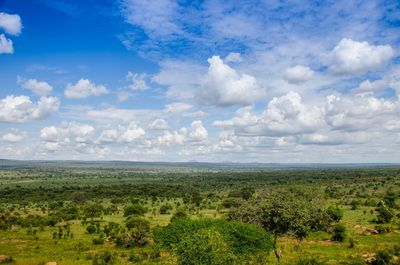 Scenic view of landscape against cloudy sky