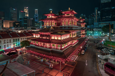 High angle view of illuminated buildings at night