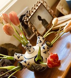 High angle view of roses in vase on table