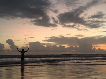 Scenic view of sea at sunset