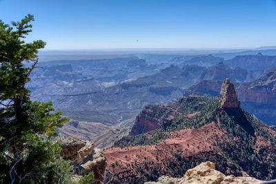 Aerial view of landscape with mountain range in background