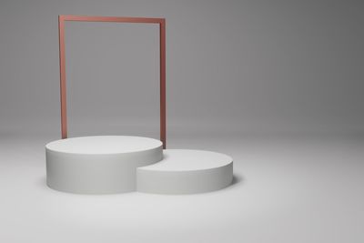 Close-up of empty glass against white background