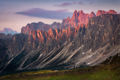 View of rock formations on landscape against sky