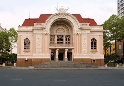 Facade of historic building against sky