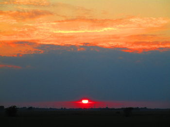 Scenic view of dramatic sky during sunset