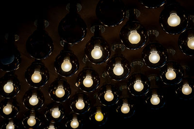 Full frame shot of illuminated light bulb