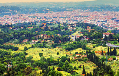 High angle view of townscape and trees in city