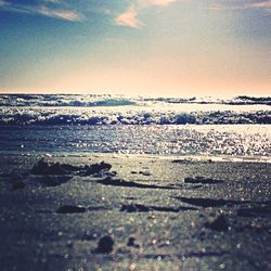 Scenic view of sea against sky at sunset