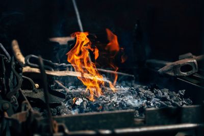 High angle view of fire in barbecue