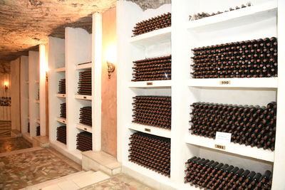 View of bottles in shelf