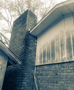 Low angle view of office building against sky