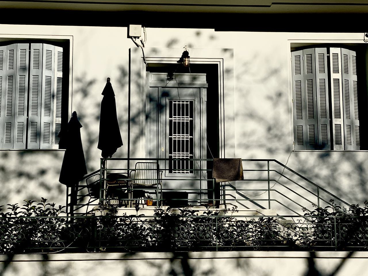 LOW ANGLE VIEW OF BUILDINGS SEEN THROUGH WINDOW