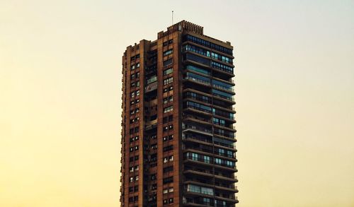 Low angle view of buildings against clear sky