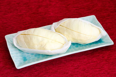 High angle view of durian served in plate on table