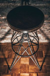 Close-up of telephone booth on wooden table