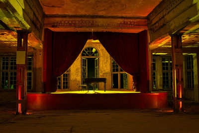 Empty corridor of old building at night