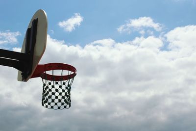 Low angle view of basketball hoop against sky