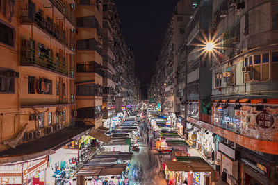 Illuminated buildings in city at night