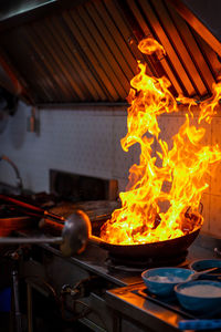 Close-up of fire on barbecue grill