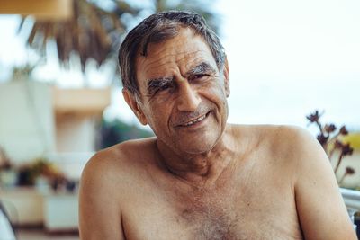 Portrait of shirtless mature man