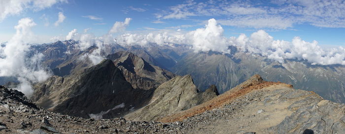 Panoramic view of snowcapped mountains against sky