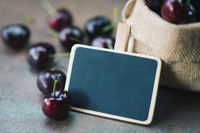 High angle view of wine and laptop on table