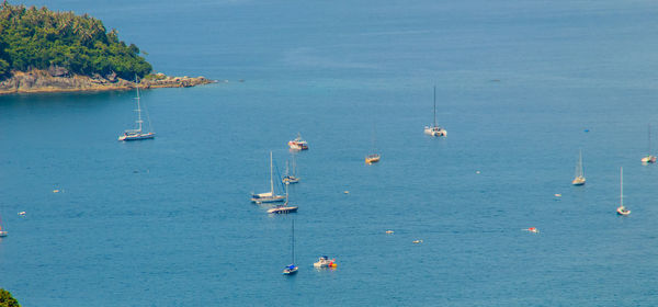 High angle view of sailboat sailing in sea