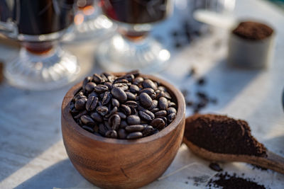 Still life with coffee beans, wooden spoon, making coffee at home