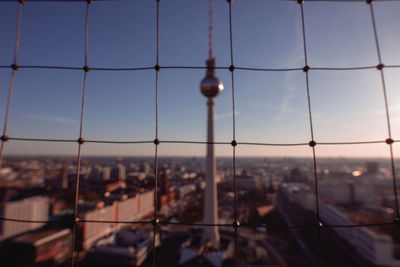 View of cityscape seen through window